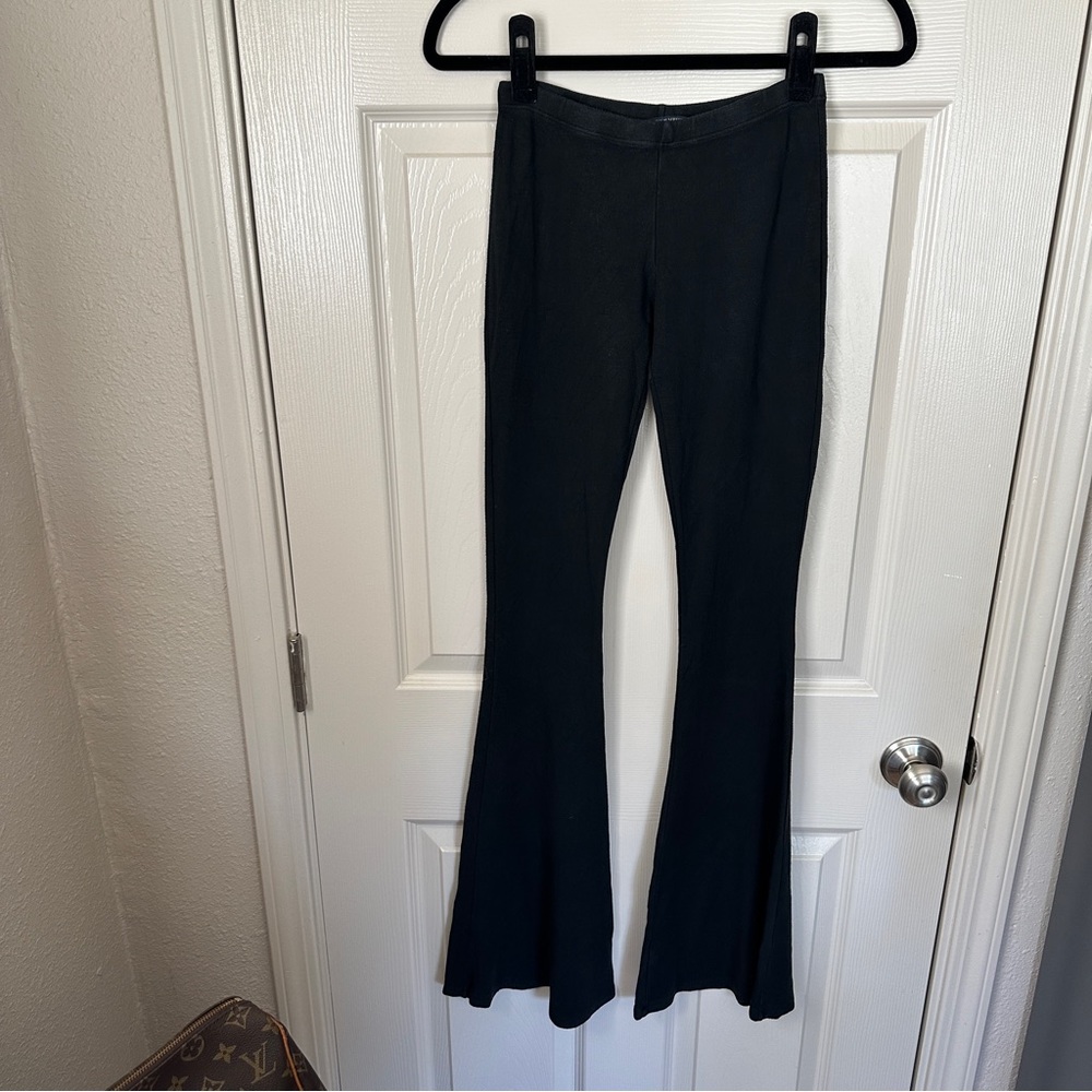brandy melville black low rise stretchy flare pants, osfm xs/s
